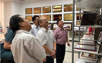 市、区工商联组织优秀民企代表到龙8头号玩家集团开展主题教育活动